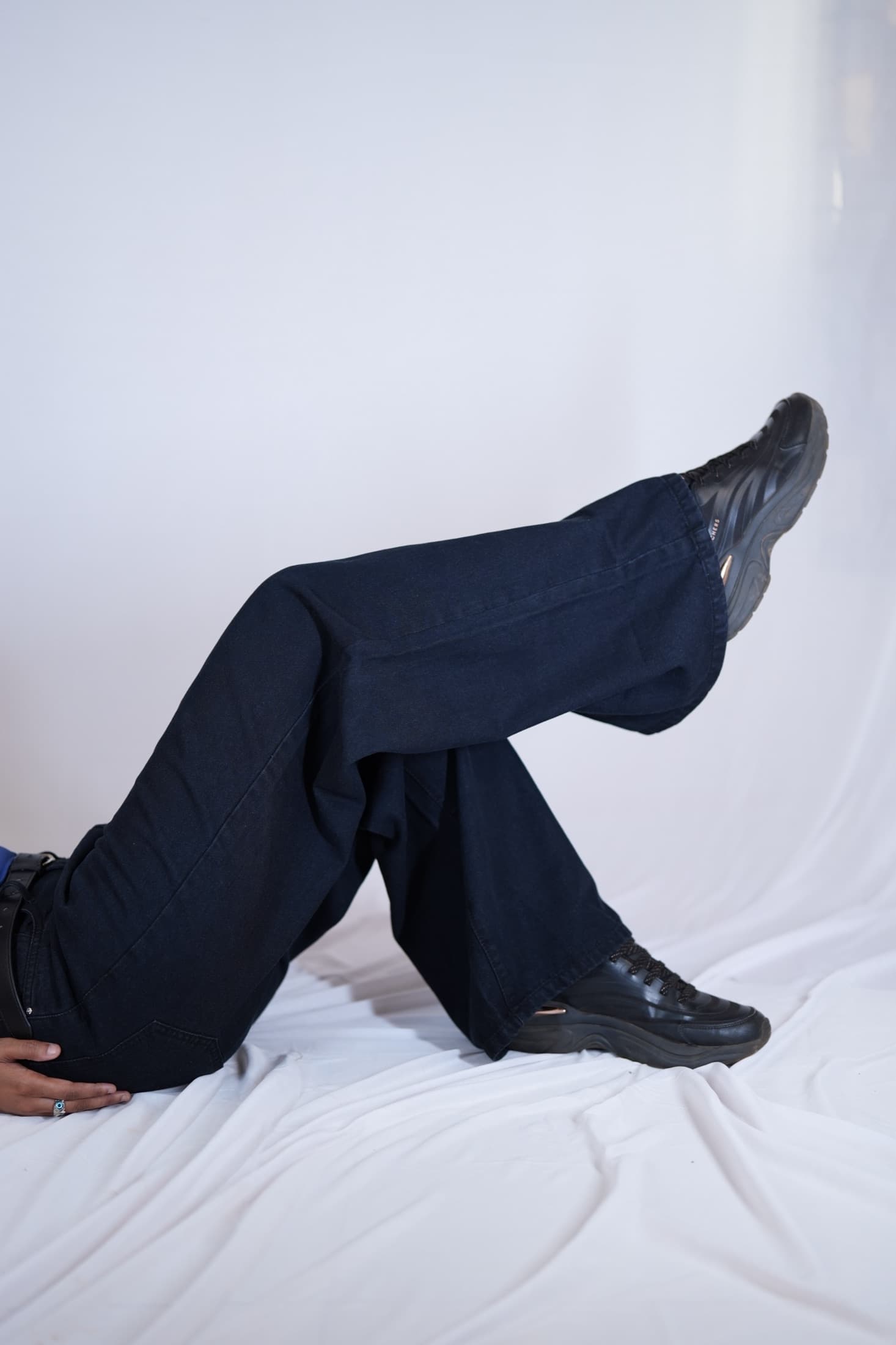 Wide-leg denim, seated
