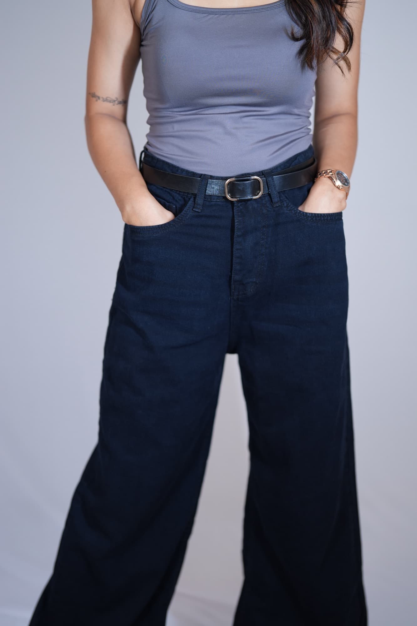 Dark wide-leg denim, front detail