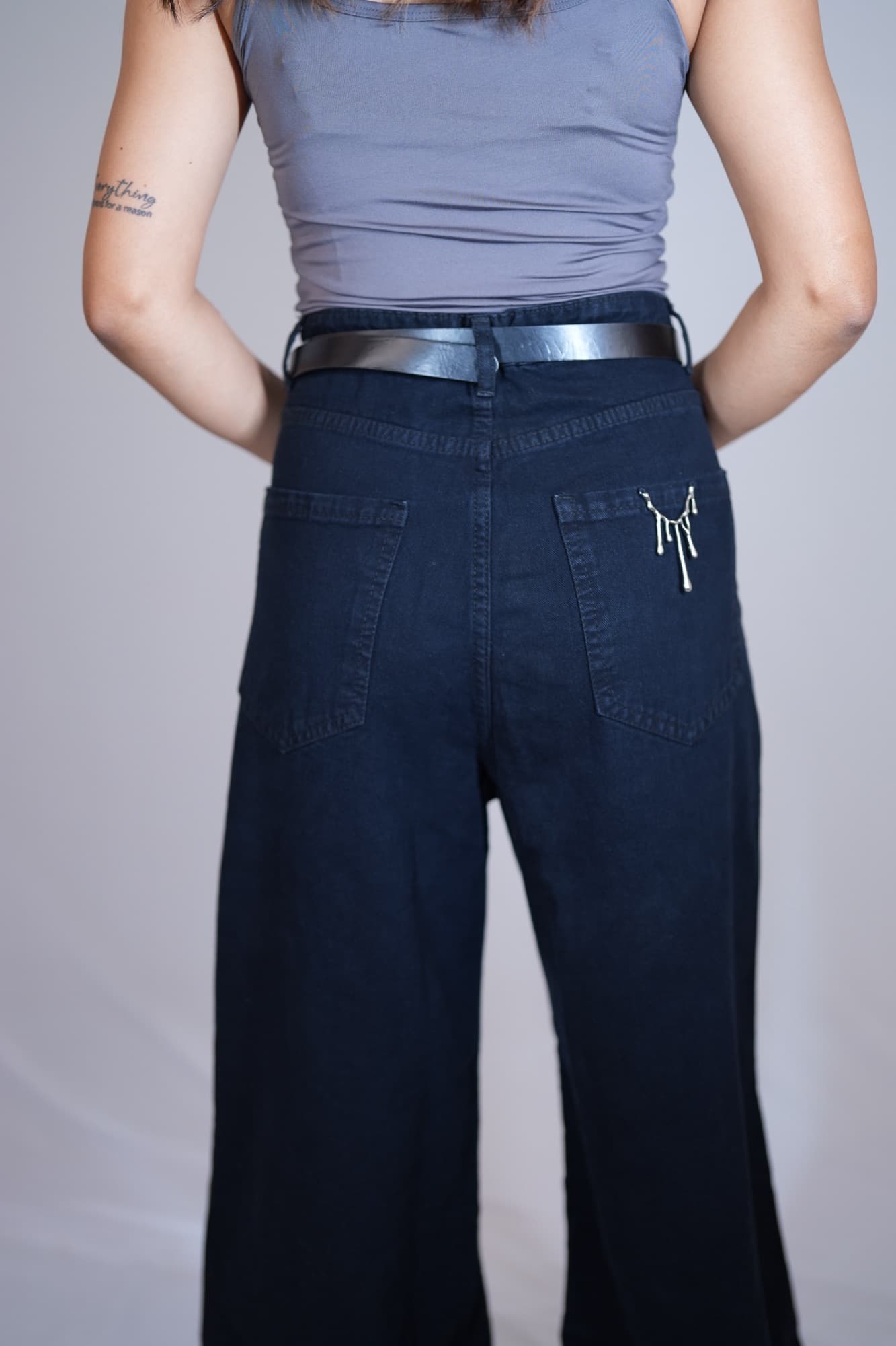 Dark wide-leg denim, back
