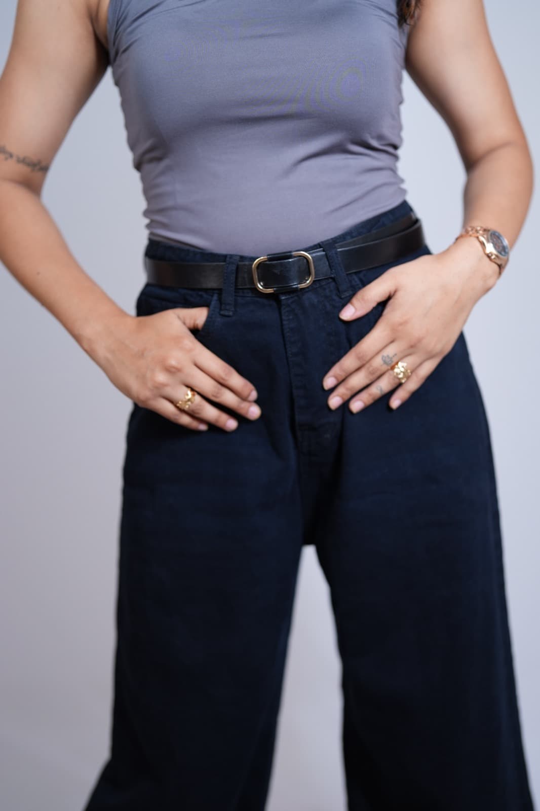 Dark wide-leg denim, waistband detail